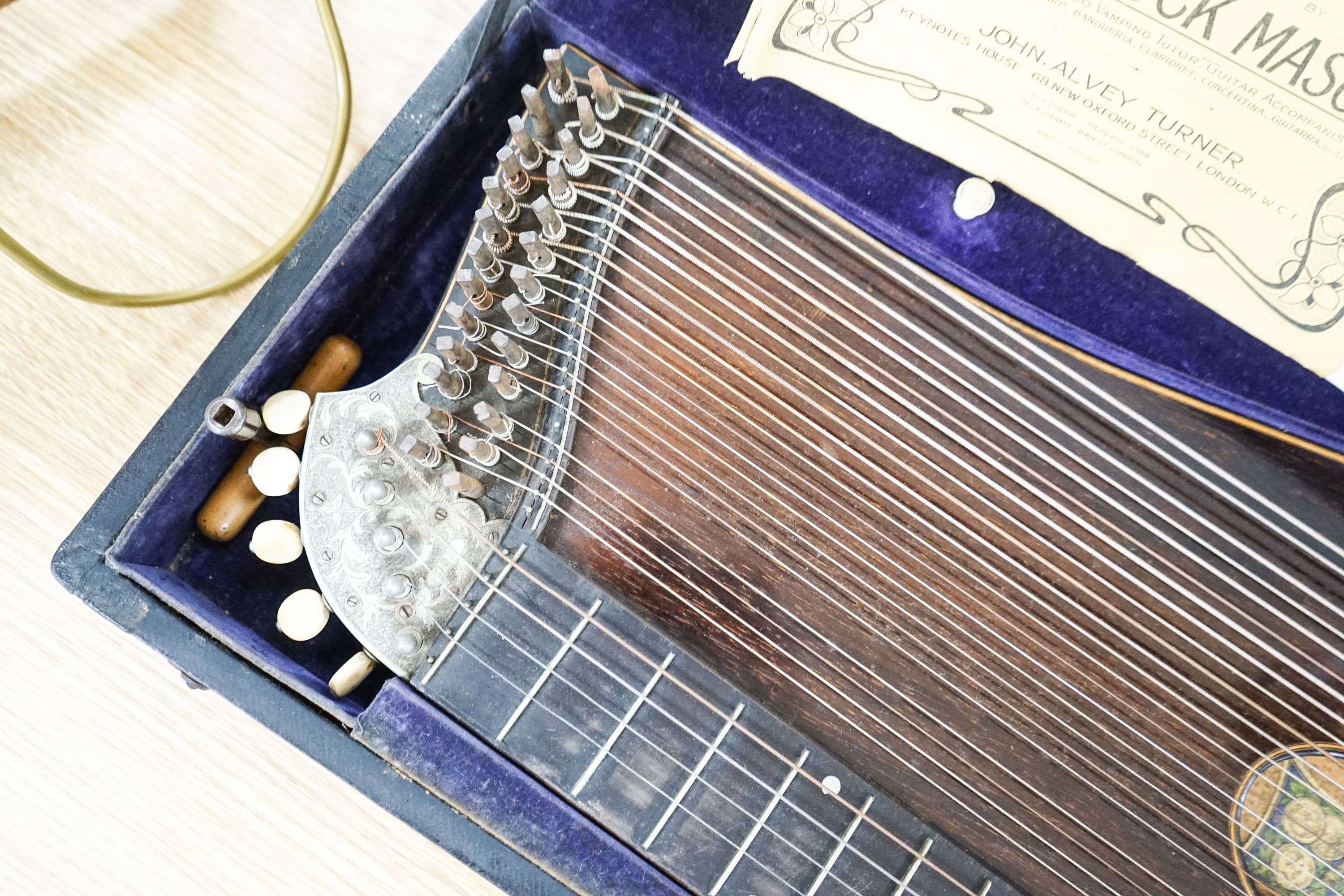 A cased J.Haslwanter guitar zither